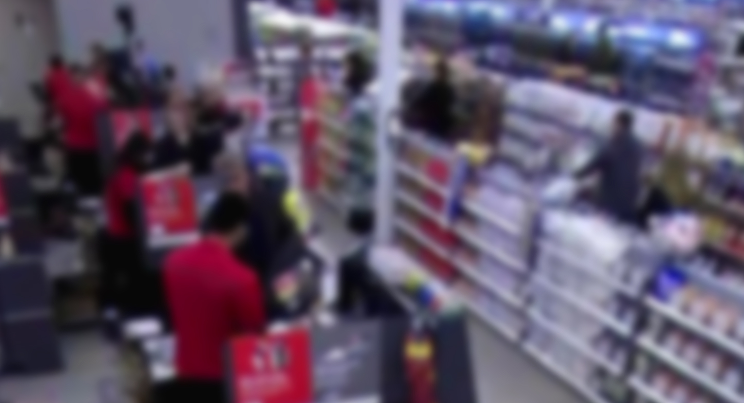 Blurred image of cash lane queue installed in a store